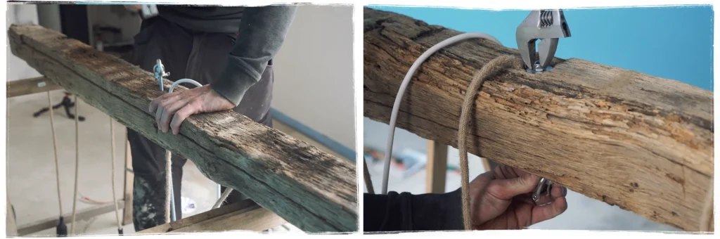 Fixation des élingues pour suspendre une poutre en bois ancien transformée en luminaire à Mazé